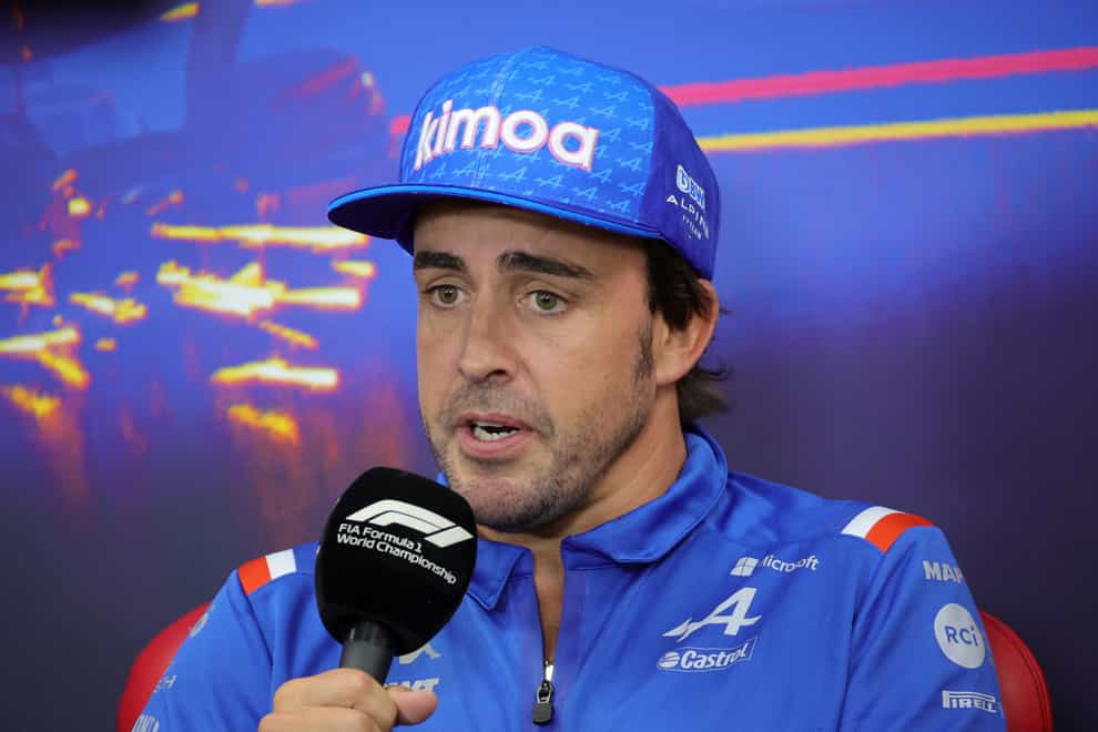 Fernando Alonso, pictured, said he would apologise to Lewis Hamilton (Olivier Matthys/AP)