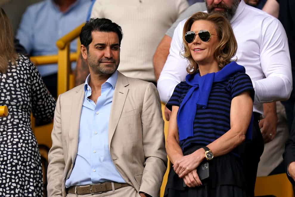 Amanda Staveley (right) and husband Mehrdad Ghodoussi were almost hit by the motorbike outside Anfield (Jacob King/PA)