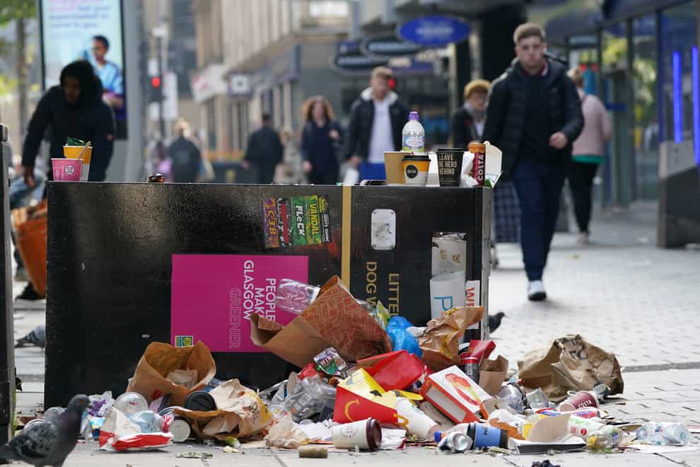 The dispute saw heaps of rubbish pile up in the streets (Andrew Milligan/PA)