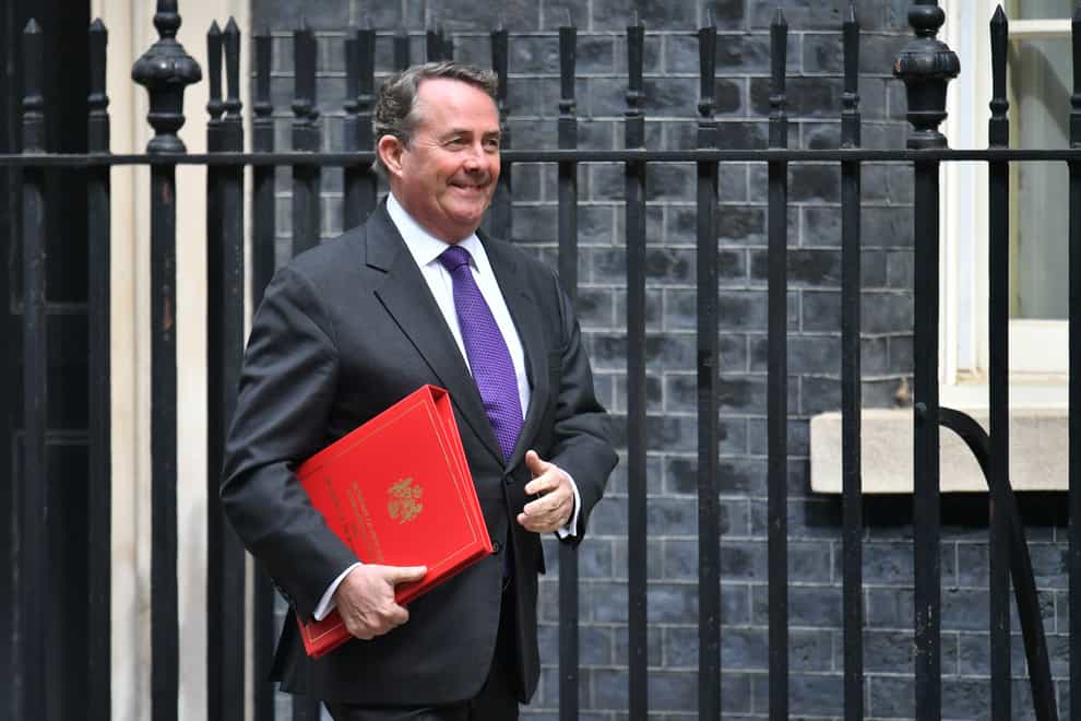 Liam Fox arrives for a cabinet meeting at 10 Downing Street (PA)