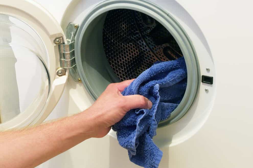 The average cost to run a washing machine yearly will rise from just over £63 to more than £117 under the new energy price cap (Alamy/PA)