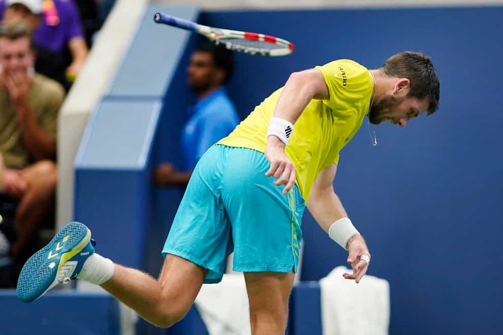 Cameron Norrie threw his racket during a straight-sets loss to Andrey Rublev (Eduardo Munoz Alvarez/AP)