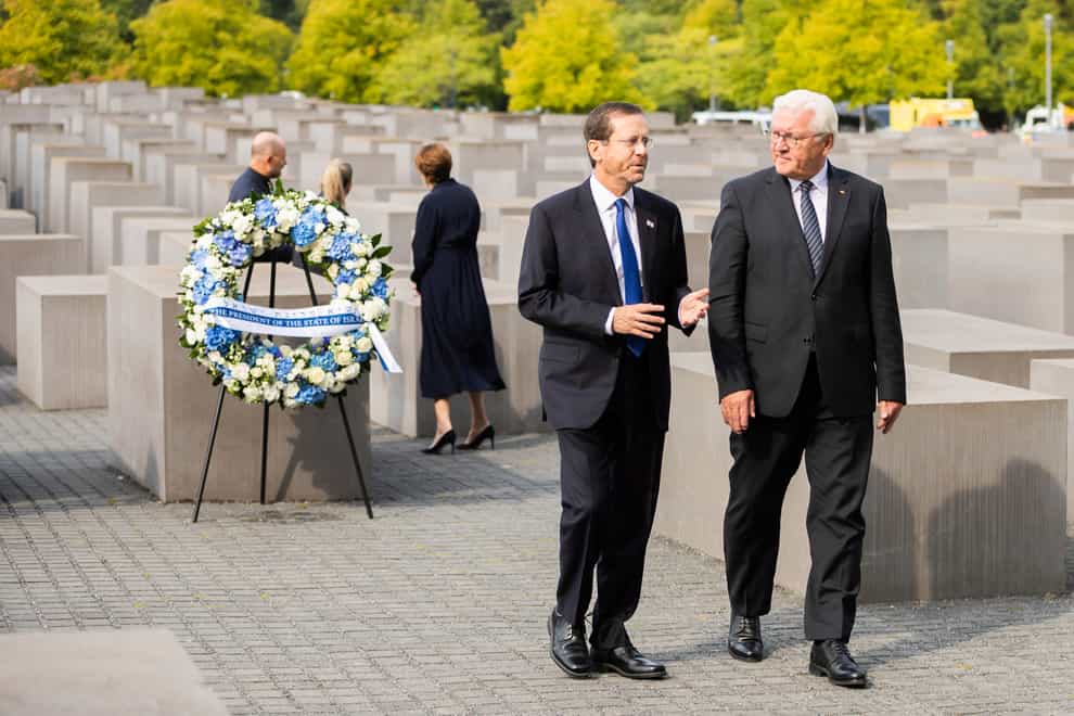 Israeli President Isaac Herzog, left, and German President Frank-Walter Steinmeier, at the Holocaust memorial in Berlin (Christoph Soeder/AP)