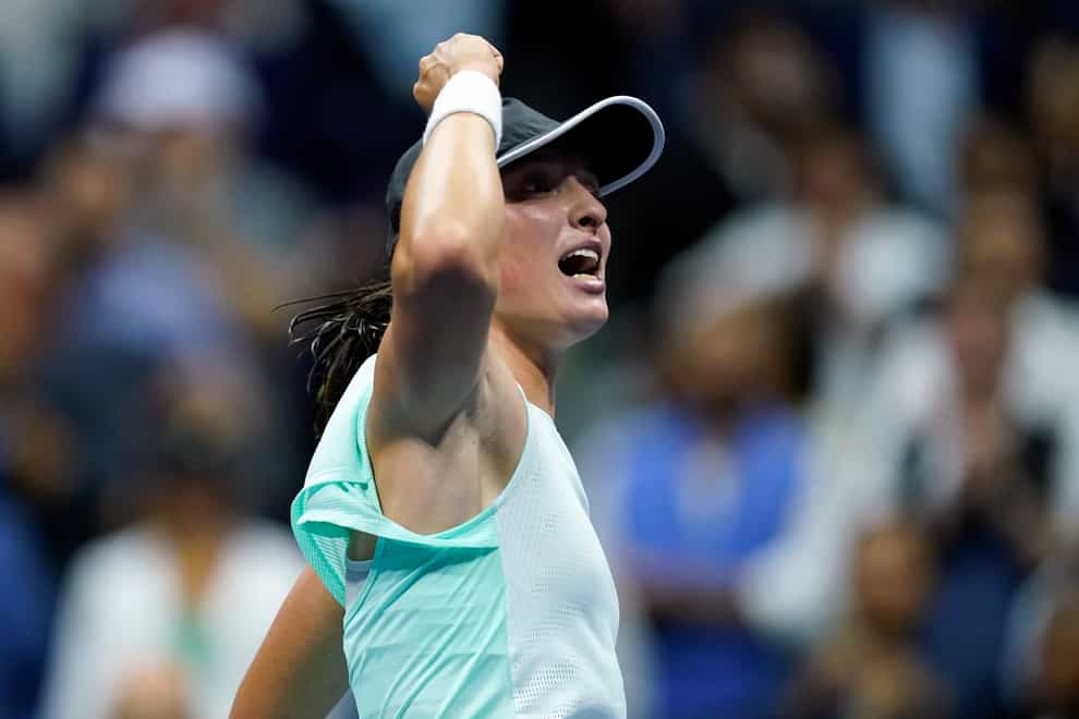 Iga Swiatek celebrates reaching the US Open semi-finals (Julia Nikhinson/AP)