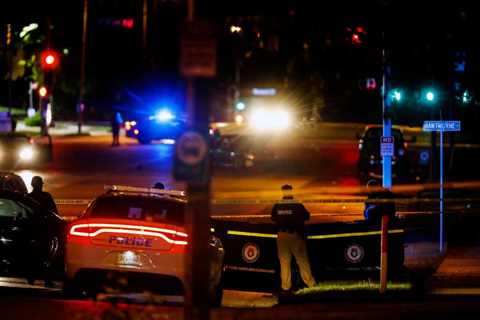 Memphis Police officers dealing with the incident as it unfolded (Daily Memphian via AP)