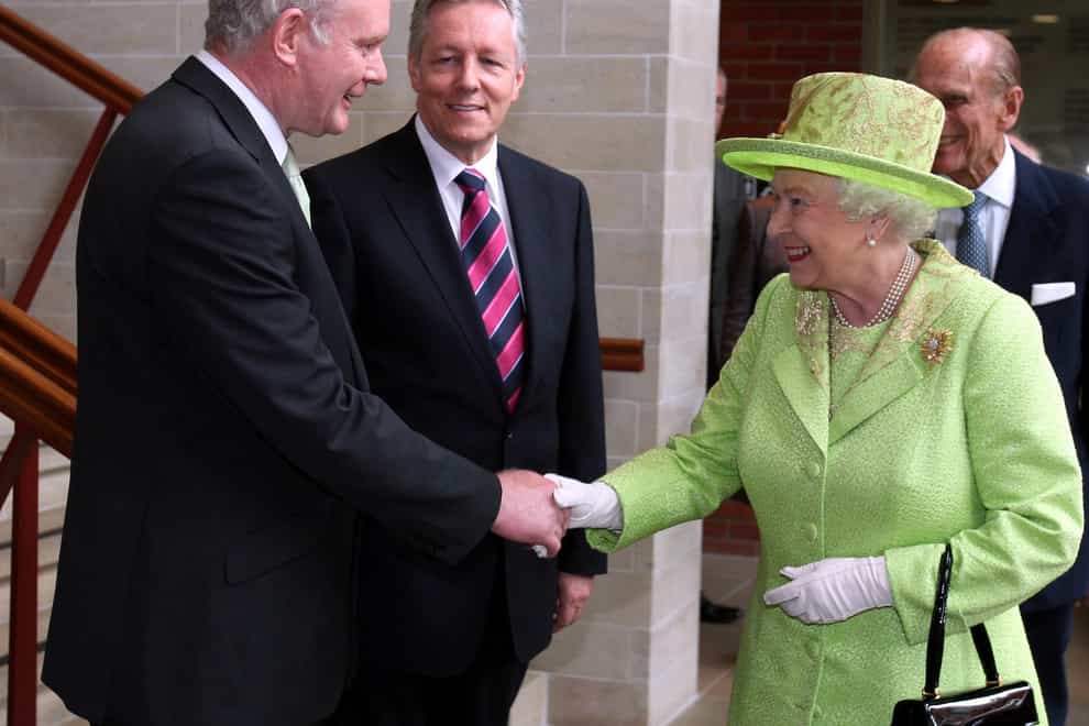 Paul Faith’s historic photograph of the Queen shaking hands with Northern Ireland’s then deputy First Minister Martin McGuinness in 2012 (Paul Faith/PA)