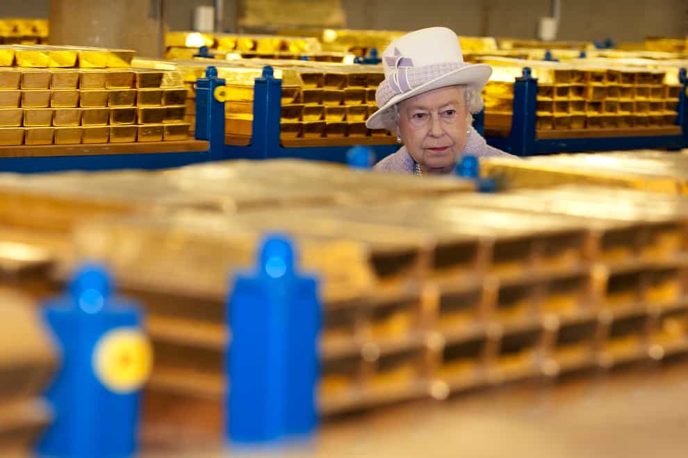The Queen tours the gold vault during a visit to the Bank of England (Eddie Mulholland/Daily Telegraph/PA)