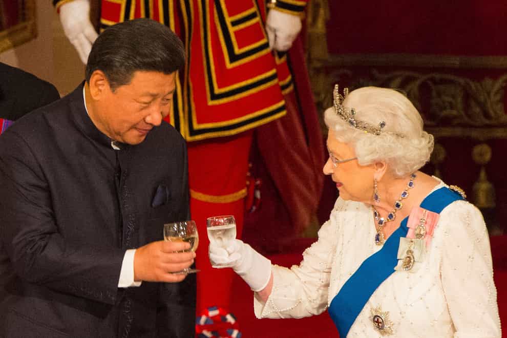 Chinese President Xi Jinping with the Queen during a state banquet at Buckingham Palace in 2015 (PA)