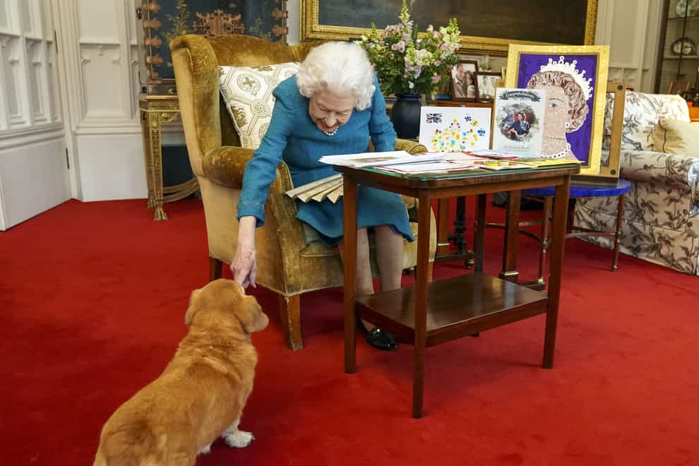 The Queen was known for her love of corgis (Steve Parsons/PA)