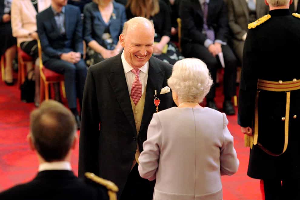 John Gosden is made an OBE by the Queen at Buckingham Palace (Jonathan Brady/PA)