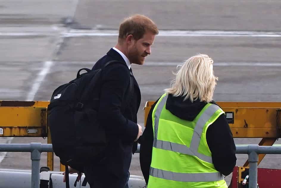 The Duke of Sussex boards a plane at Aberdeen Airport as he travels to London following the death of Queen Elizabeth II on Thursday. (Aaron Chown/PA)