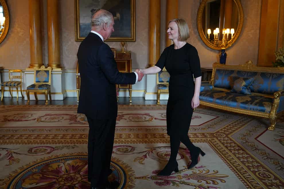 Charles shakes hands with Liz Truss during their first audience at Buckingham Palace (Yui Mok/PA)