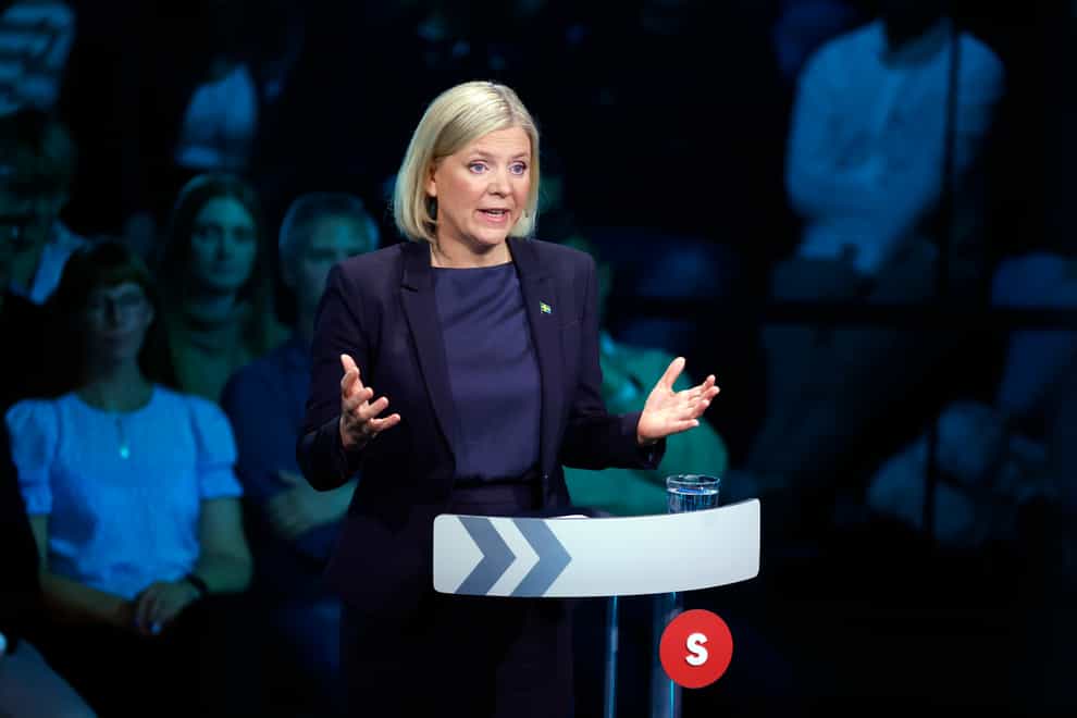 Swedish Prime Minister Magdalena Andersson, leader of the Social Democrats, takes part in a political debate broadcast on TV4 from Eskilstuna, Sweden (Christine Olsson/TT via AP)