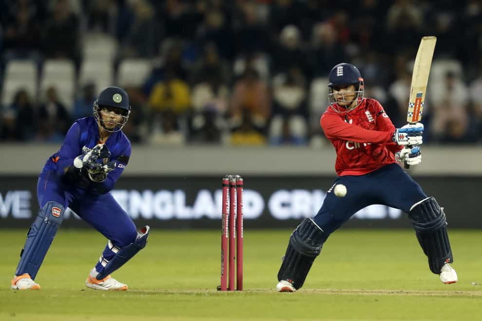 Sophia Dunkley (right) helped guide England to victory in the opening T20 international against India (Will Matthews/PA)