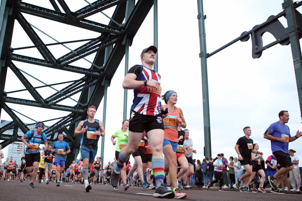 Runners cross the Tyne Bridge during the Great North Run (Will Matthews/PA)