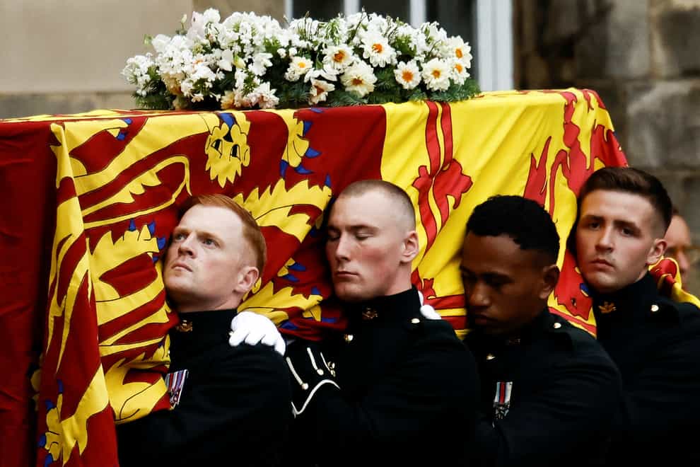 Pallbearers carry the Queen’s coffin (PA)