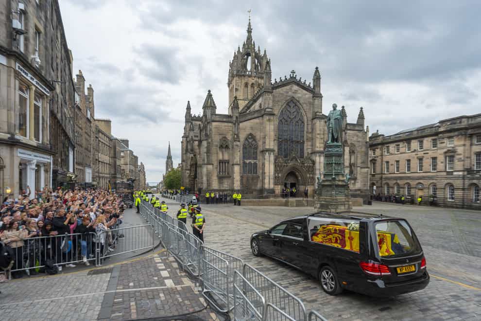 The hearse carrying the coffin of the Queen passes St Giles Cathedral (Phil Wilkinson/The Scotsman/PA)