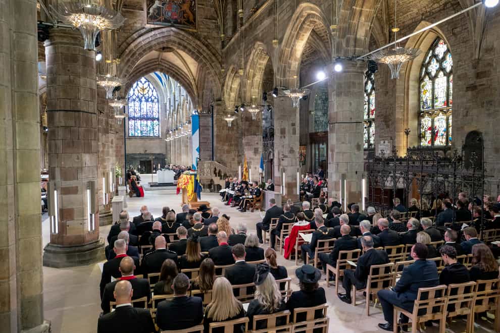 The King, the Queen Consort and other members of the royal family at St Giles’ Cathedral (Jane Barlow/PA)
