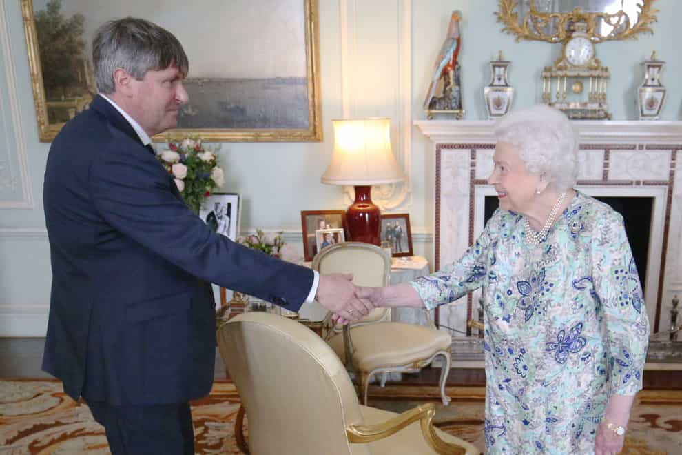 Queen Elizabeth II receives Simon Armitage (Jonathan Brady/PA)