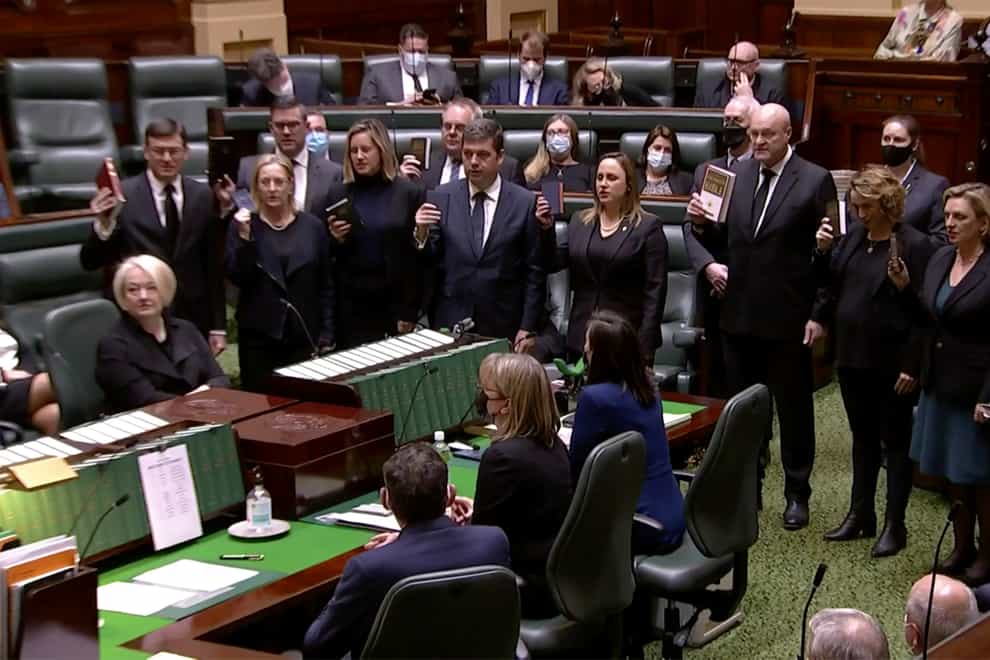 Lawmakers attend a ceremony to pledge their allegiance to King Charles III (Victoria State Parliament TV via AP)
