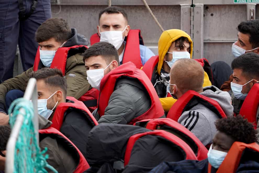 A group of people thought to be migrants, are brought in to Dover, Kent, from a Border Force vessel (Gareth Fuller/PA)