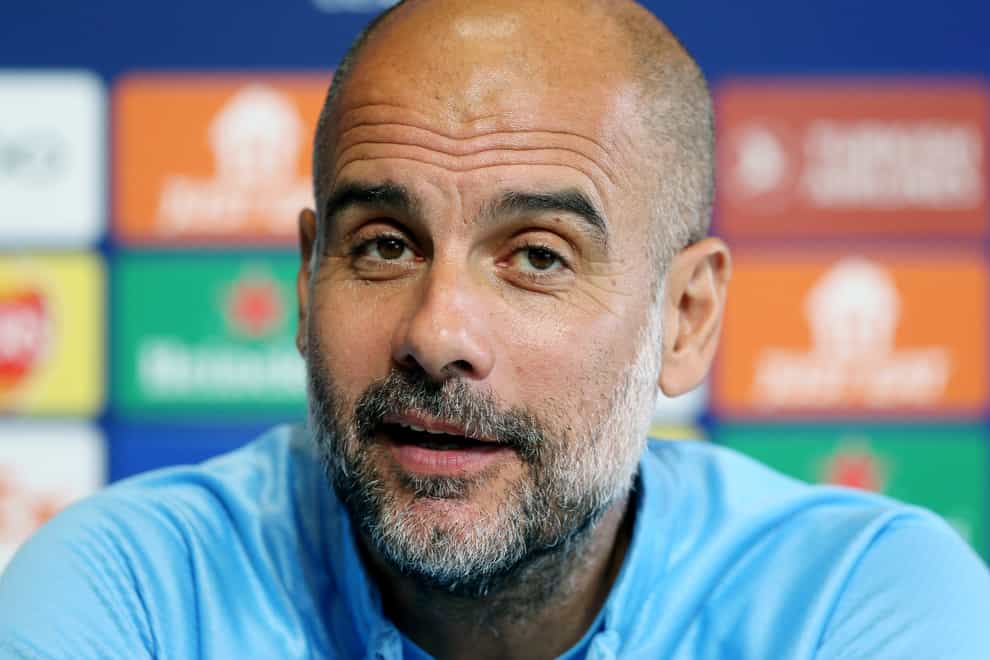 Pep Guardiola is not worried about a fixture pile-up (Barrington Coombs/PA)