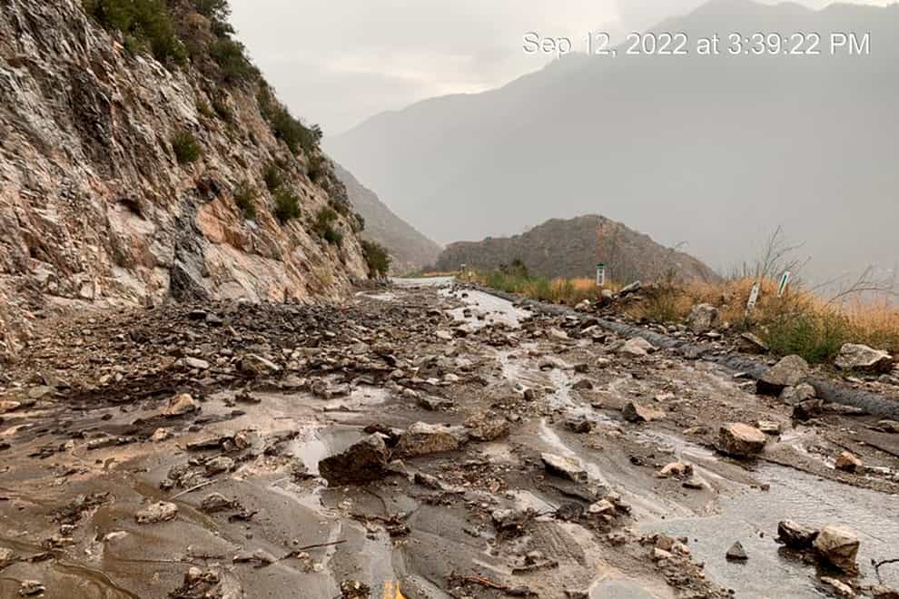 This Monday afternoon, Sept. 12, 2022, image released by Caltrans District 8 shows mudslides that closed part of Highway SR-38 in the San Bernardino Mountains, Calif. The mud flows and flash flooding occurred in parts of the San Bernardino Mountains where there are burn scars, areas where there’s little vegetation to hold the soil, from the 2020 wildfires. (Caltrans District 8 via AP)
