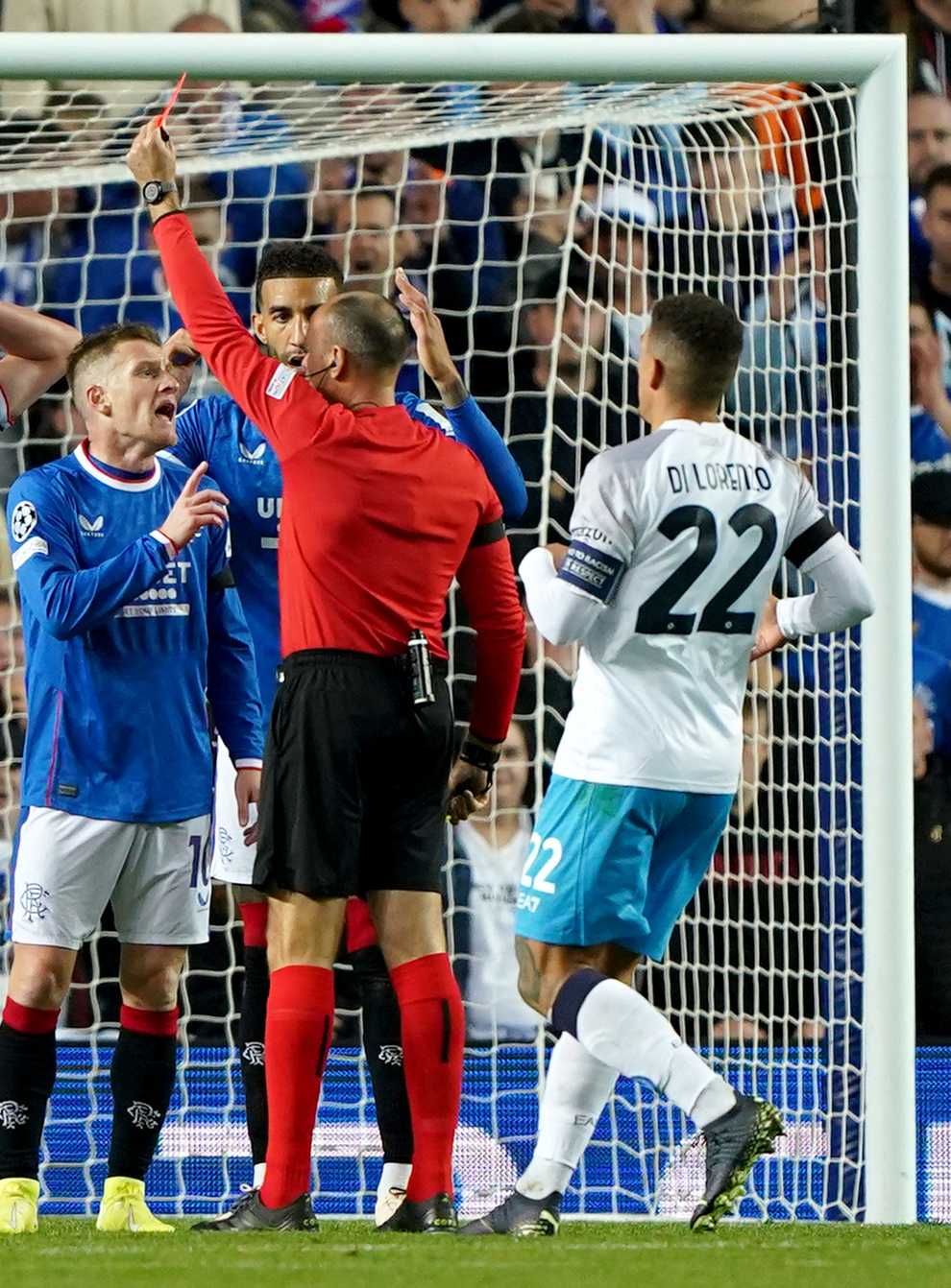 James Sands (centre) is shown a red card (Andrew Milligan/PA)