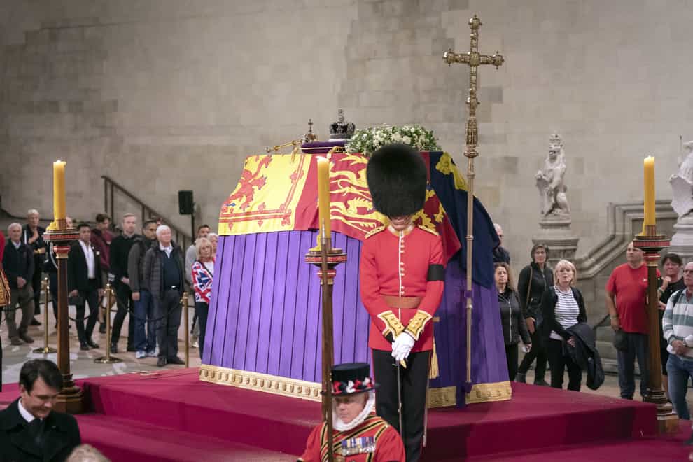 Members of the public file past the Queen’s coffin as it lies in state in Westminster Hall (Danny Lawson/PA)