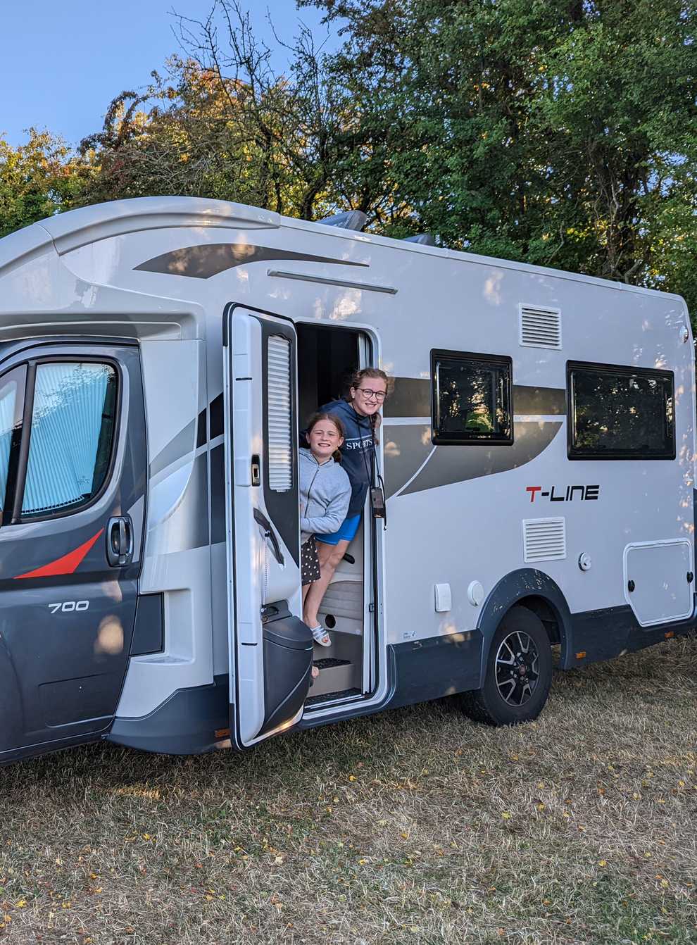 Rosie, Poppy and our home on wheels for the weekend (Claire Spreadbury/PA)