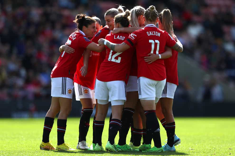 Manchester United players celebrate after Maya Le Tissier opens the scoring in their Women’s Super League victory over Reading (Tim Markland/PA)