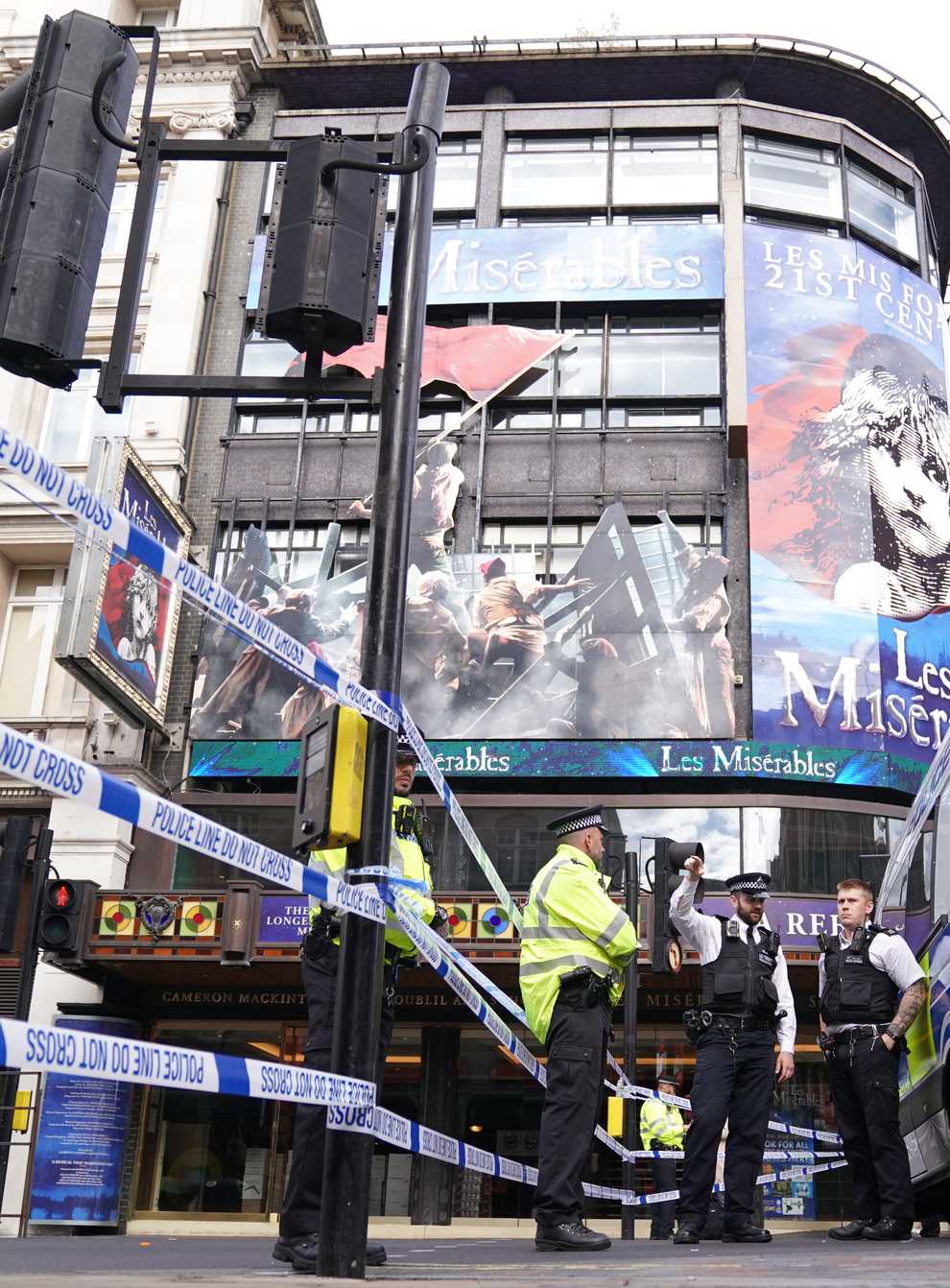 Police at the scene in Shaftesbury Avenue, central London (PA)