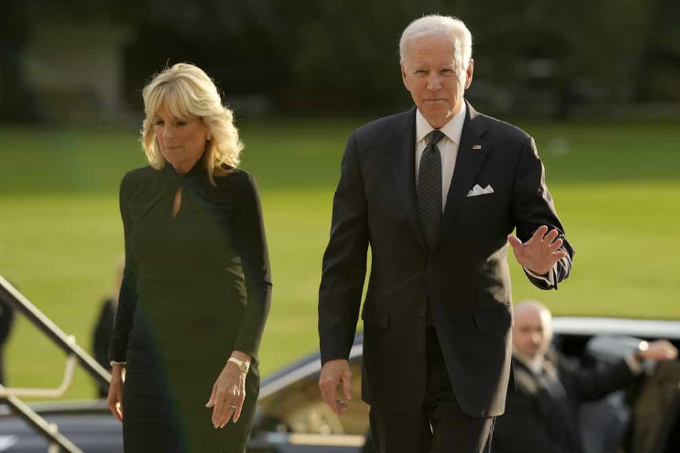US President Joe Biden accompanied by the First Lady Jill Biden arrive for a reception hosted by the King (Markus Schreiber/PA)