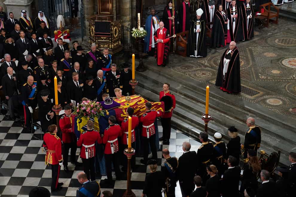 The Queen’s coffin is placed near the altar in Westminster Abbey (Gareth Fuller/PA)
