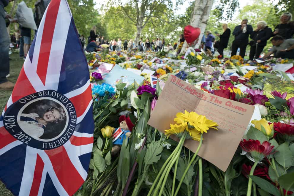 Floral tributes in Hyde Park (Danny Lawson/PA)