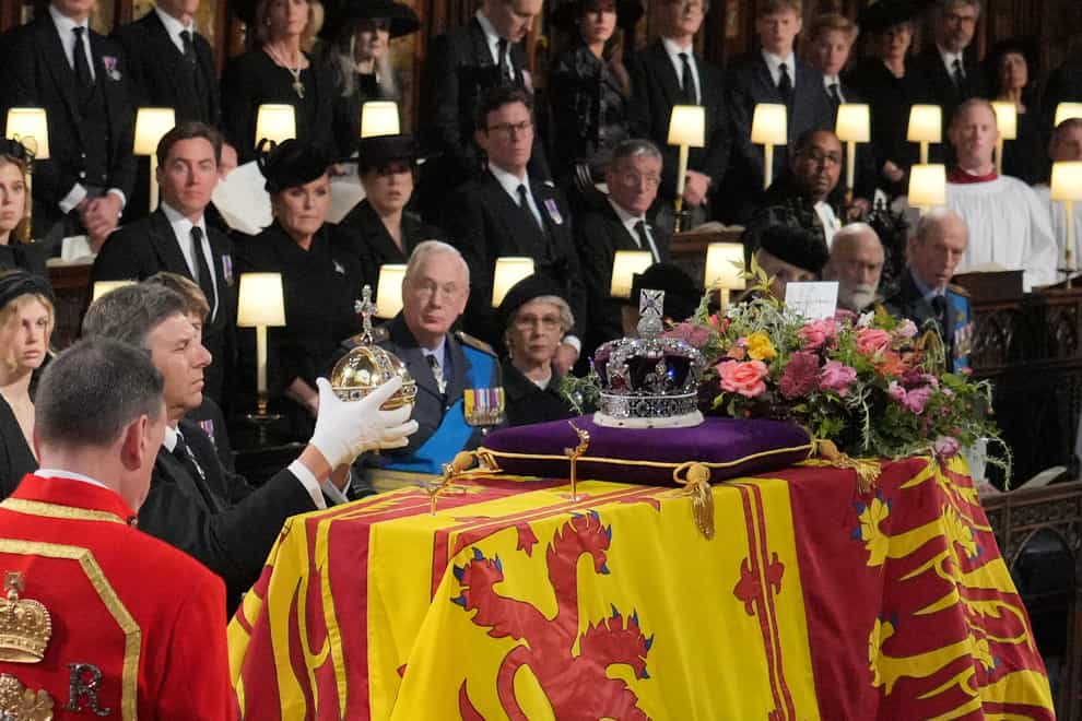 The Orb and Sceptre are removed from the coffin at the Committal Service for Queen Elizabeth II, held at St George’s Chapel in Windsor Castle, Berkshire. Picture date: Monday September 19, 2022.