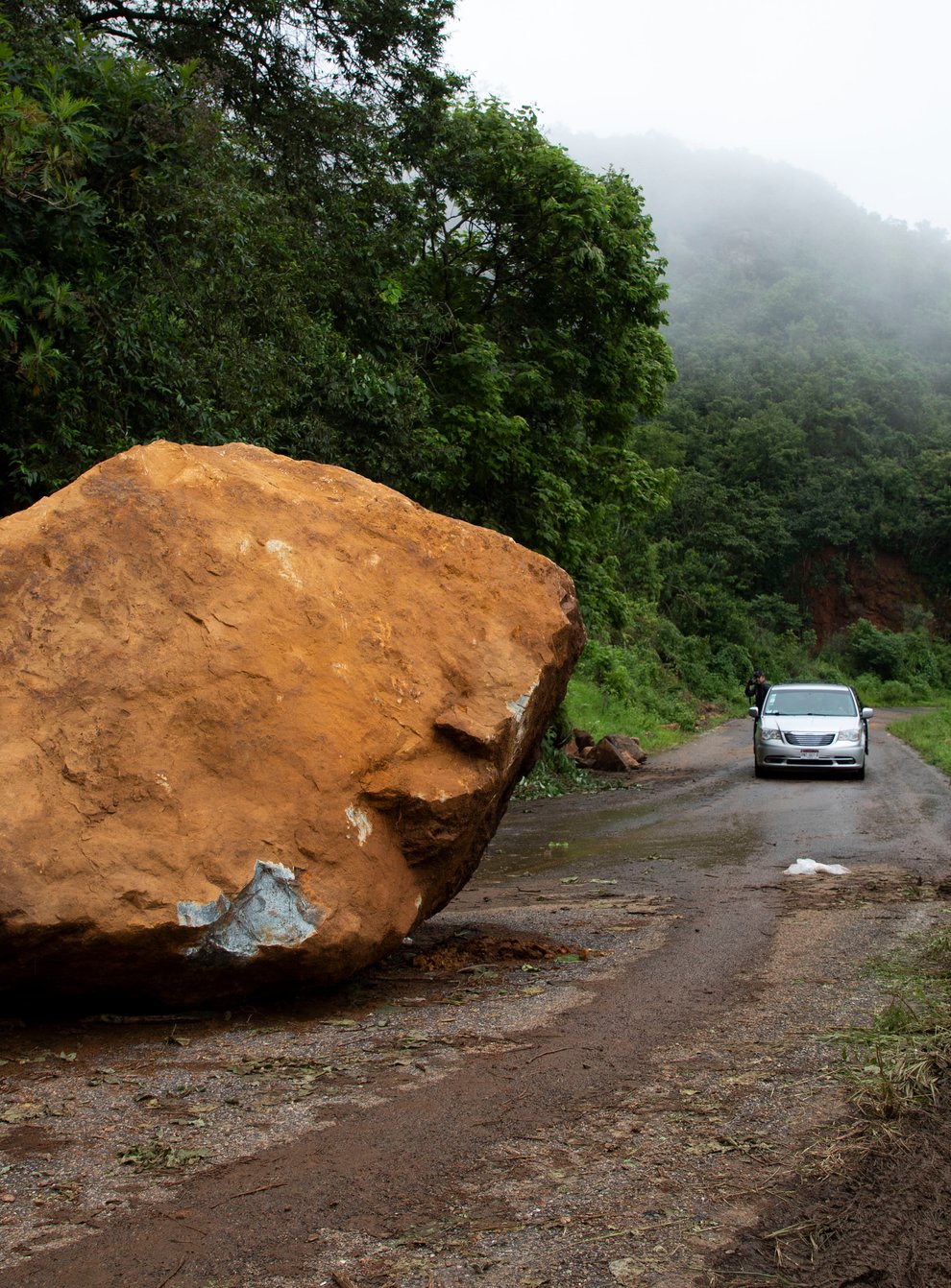 A huge boulder sits on a road, a day after an earthquake near Chinicuila, Michoacan state, Mexico, Tuesday, Sept. 20, 2022. A magnitude 7.6 earthquake shook Mexico’s central Pacific coast on Monday, centered 37 kilometers (23 miles) southeast of Aquila near the boundary of Colima and Michoacan states and at a depth of 15.1 kilometers (9.4 miles). (AP Photo/Armando Solis)