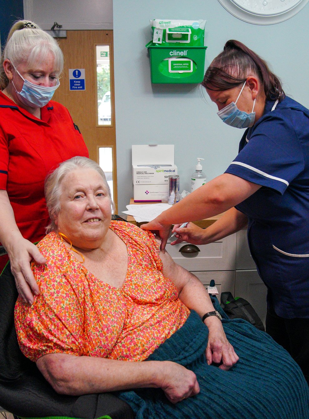 Care home resident Sylvia Everritt receives her autumn Covid-19 booster vaccination at Gorsey Clough Nursing Home, Tottington, Bury (Peter Byrne/PA)