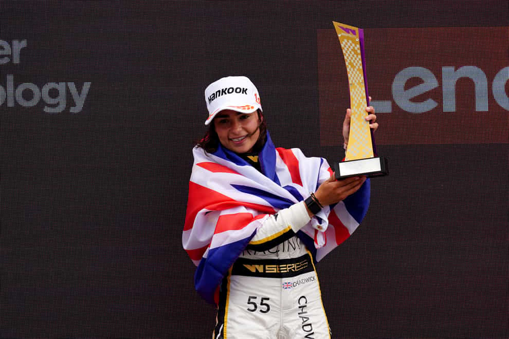 Jamie Chadwick celebrates winning at Silverstone earlier this year (David Davies/PA)