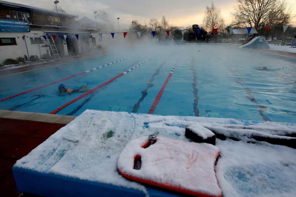 Experts said that education is also needed on the health risks associated with taking a dip in icy water (Steve Parsons/PA)