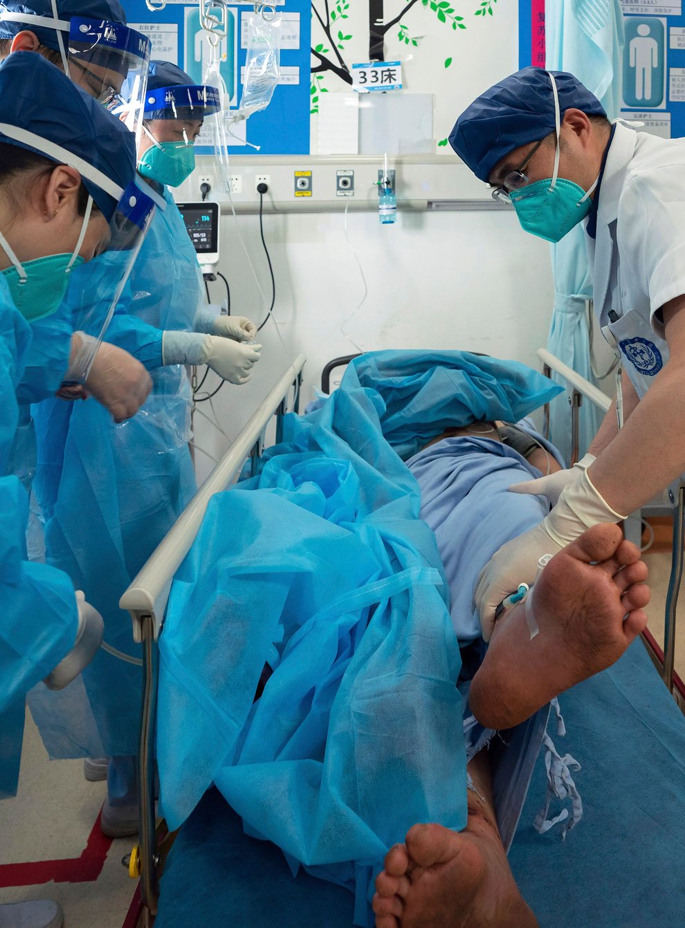 Medics check the condition of Gan Yu (Xinhua/AP)