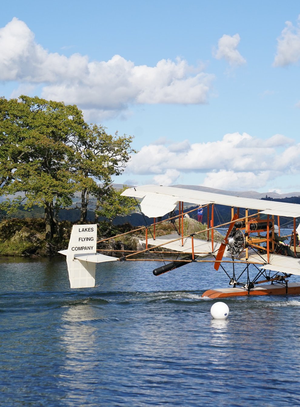 A replica of seaplane Waterbird on its first public flight on Lake Windermere in Cumbria (Owen Humphreys/PA)