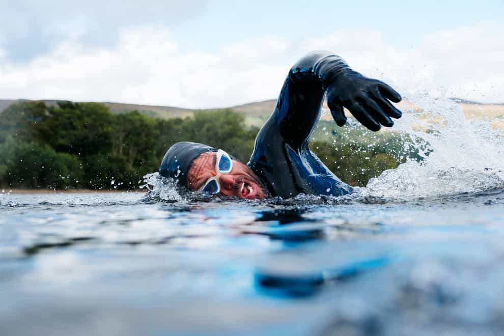 Extreme adventurer Ross Edgley has broken the record for the longest ever open water swim in Loch Ness. (Jonty Storey/PA)