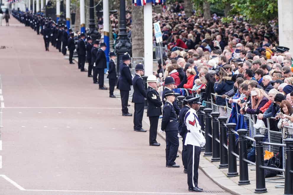 Police officers line The Mall in central London on the day of the funeral of Queen Elizabeth II at Westminster Abbey (Ian West/PA)
