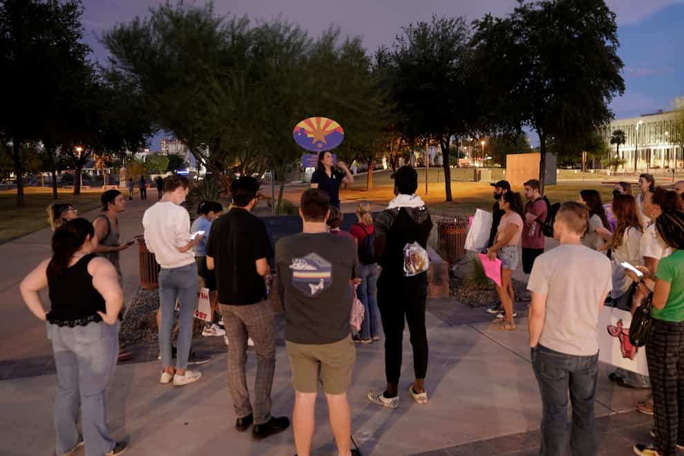 Protesters gather outside the Capitol to voice their dissent with an abortion ruling in Phoenix, Arizona (Matt York/PA)