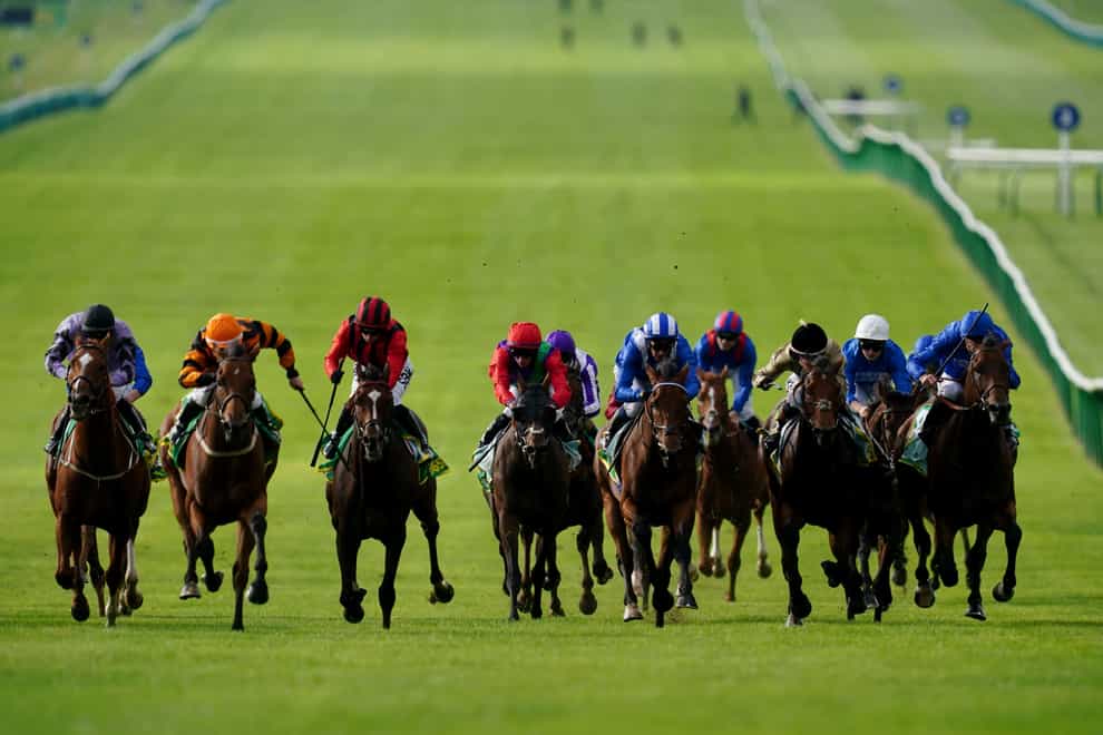 Majestic (second left) on his way to winning the Cambridgeshire at Newmarket (David Davies/PA)