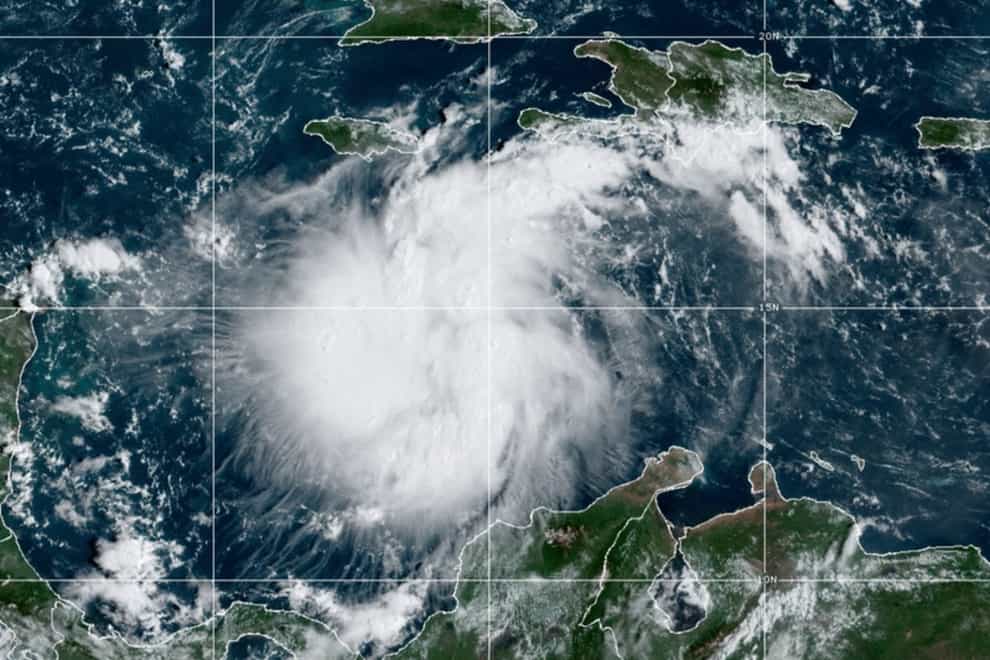 A satellite image shows Tropical Storm Ian over the central Caribbean on Saturday (NOAA via AP)