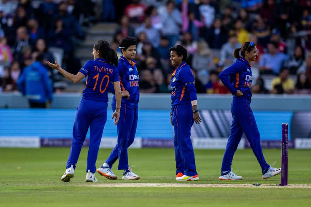 Deepti Sharma, centre right, and India celebrate victory (Steven Paston/PA)