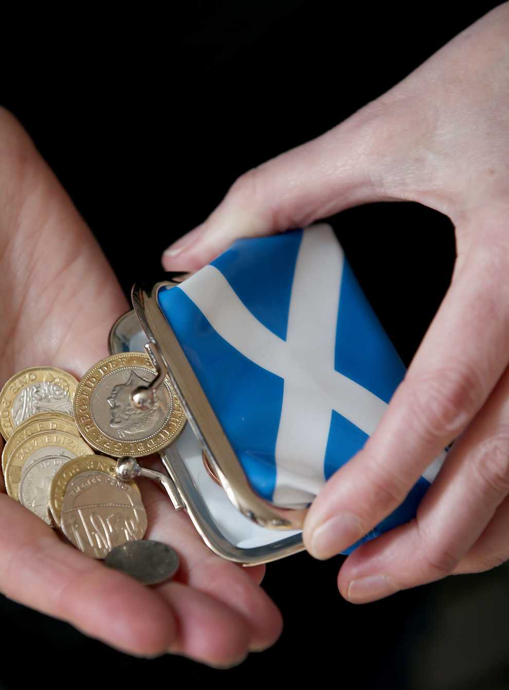 Scotland risks being ‘left behind’ unless SNP ministers adopt the tax cutting policies announces for the rest of the UK by Chancellor Kwasi Kwarteng, a Tory MP warned (Jane Barlow/PA)