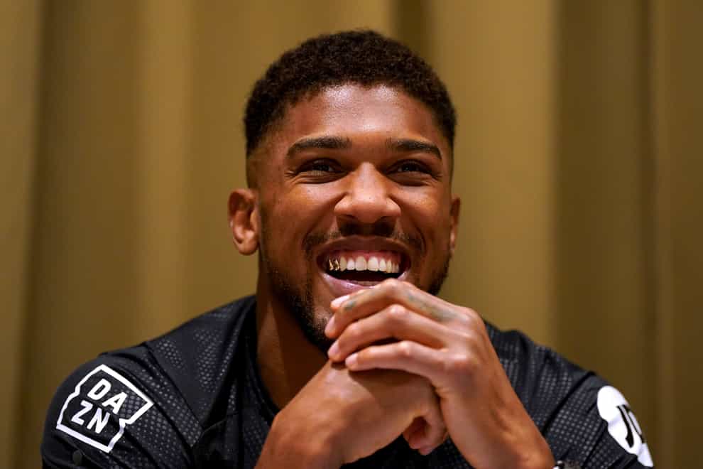 Anthony Joshua insists he will sign the contract to fight Tyson Fury (Nick Potts/PA)